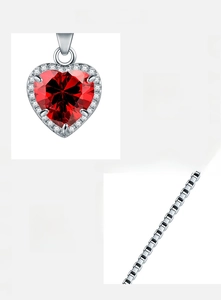 Detailed view of 925 sterling silver necklace with heart-shaped red zircon pendant