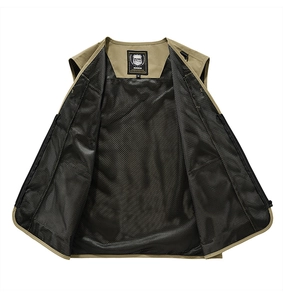 Detail of khaki outdoor vest showing breathable black mesh lining and inner label