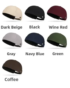 Detailed grid view of brimless docker caps in seven colors with metal maple leaf badge