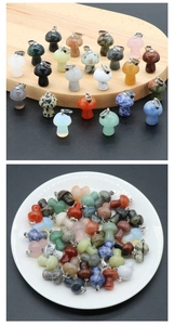 Macro shot of 2cm mini mushroom crystal pendants in various natural stones and colors