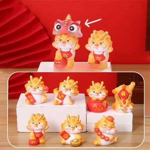 Detail view of Tang Dynasty style girl figurines with removable lion hats and lucky charms