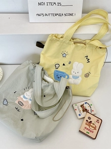Grande borsa tote in tela con ricamo a coniglio e chiusura a coulisse per pendolari