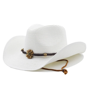 White woven cowboy hat with wide brim, dark brown decorative band and adjustable chin strap