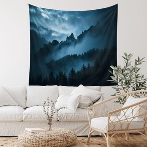Detail of forest mountain tapestry hanging above a sofa in a modern minimalist room