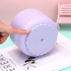 Rotating large capacity purple desk organizer with vertical textures and wavy base