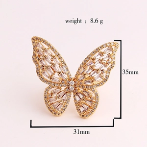 Detail view of 31x35mm gold butterfly ring with micro-pave cubic zirconia crystals