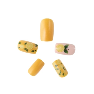 Summer lemon theme press-on nails with yellow and floral designs on white background