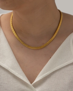Classic 18K gold plated stainless steel woven chain necklace on model for daily wear