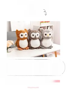 Detailed view of high quality soft plush owl toys in brown, dark and light gray colors