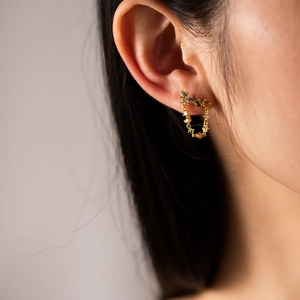 Elegant S925 sterling silver gold-plated earrings with colorful zircon stones on model