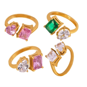 Adjustable gold rings set with colorful pear and rectangular cut gemstones