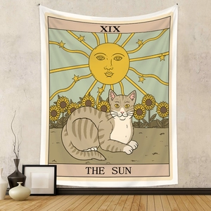 Detailed texture of the sun tarot cat tapestry hanging on a rustic grey concrete wall