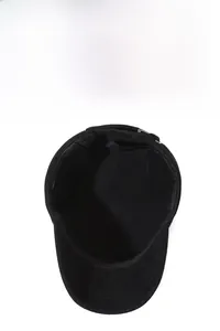 Detail view of the thick plush lining inside a black men's winter thermal flat top hat