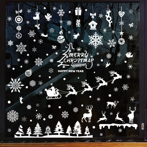White Christmas window stickers featuring Santa, reindeer, and snowflakes for glass decoration
