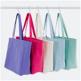Assorted colorful canvas drawstring tote bags in purple, rose, beige, blue and mint green