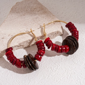 Ethnic style round hoop earrings with red and brown coconut shell beads and gold metal hooks