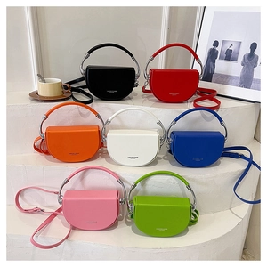 Detailed collection of semi-circular leather saddle bags in seven vibrant fashion colors