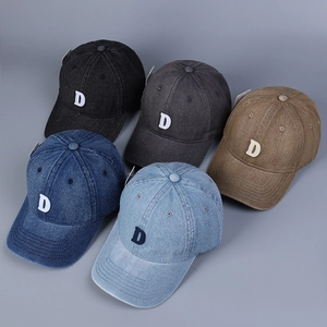 Multiple colors of washed denim baseball caps with embroidered D letter patches