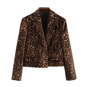 Detailed flat lay of leopard print cropped blazer with velvet texture and lapel collar
