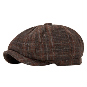 Classic plaid wool newsboy cap for men featuring a vintage brown herringbone pattern