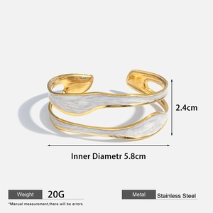 Detail showing dimensions of gold stainless steel bangle with white textured inlay