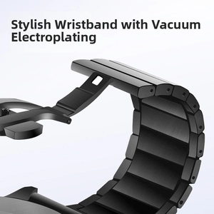 Macro detail of black vacuum-plated stainless steel watch strap with solid links