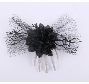 Halloween ghost hand hair clip with large black flower, mesh bow and skeletal fingers