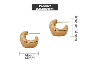 Macro view of gold square C-shaped acrylic earrings with polished finish and 14mm dimensions