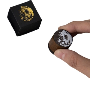 Retro wooden round lunar stamp with lunar surface pattern and minimalist black gift box