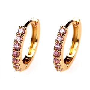 Close-up of 18K gold plated hoop earrings featuring sparkling pink zircon gemstones