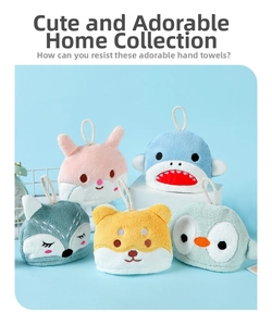 Close-up of five hanging cartoon animal hand towels in soft coral fleece fabric