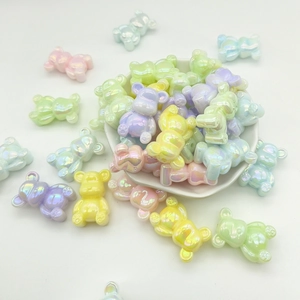 Colorful gradient resin bear beads for DIY jewelry making in a star-shaped bowl