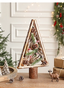 Close-up detail of wooden Christmas tree decor with natural pine cones and red berries