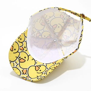 Inside view of a yellow cartoon duck baseball cap showing reinforced stitching and adjustable strap
