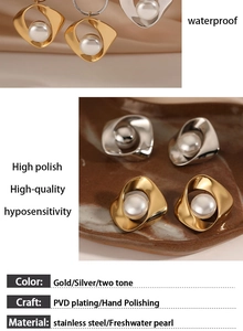 Macro detail of high polish PVD gold stainless steel jewelry set with freshwater pearls