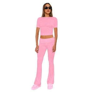 Women's two-piece set featuring a pink short-sleeve slim T-shirt and matching wide-leg pants