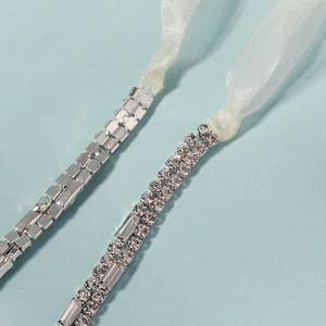 Luxury bridal rhinestone hairband and waist chain set with silver crystals and white ribbons