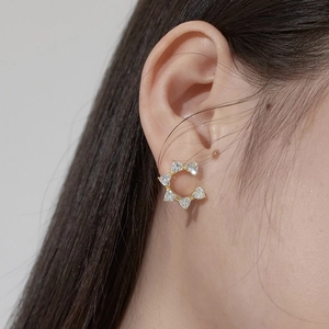 Elegant C-shaped gold earrings for women with heart-cut cubic zirconia inlays