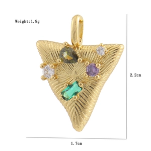 Detailed view of textured gold triangle pendant with multicolor gemstones and dimensions