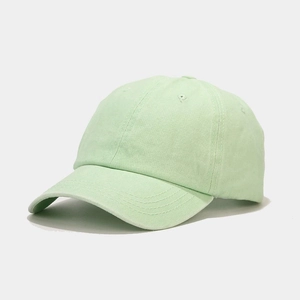 Vue détaillée d'une casquette de baseball vert menthe en coton avec bord cousu