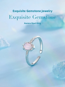 Macro shot of S925 sterling silver stamp and teardrop opal on hammered ring band