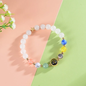 Detailed shot of beaded Gemini constellation bracelet with colorful translucent stones