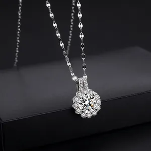 Macro view of sunflower pendant with large center diamond and cluster setting