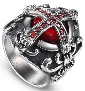 Detail of gothic cross ring with vintage silver finish and red zircon center stone