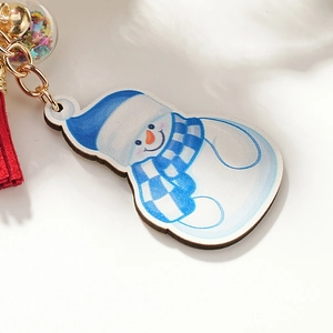 Cartoon wooden snowman keychain with red tassel and colorful star glass ball pendant