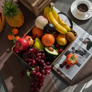 Realistic artificial fruit basket with banana, grape and apple for home window display