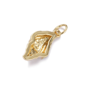 Detail of organic shaped 18K gold plated textured pendant charm for jewelry making