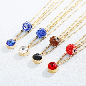 Set of four stainless steel gold necklaces with colorful gemstone sphere pendants
