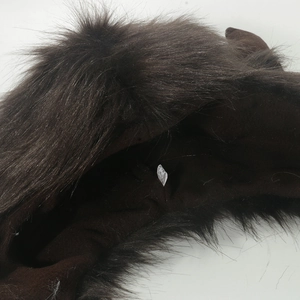 Winter faux fur trapper hat with horns featuring warm plush lining and earflaps