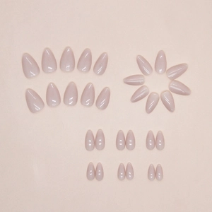 Glossy nude pink almond shape press-on nails set with 22 pieces in various sizes